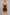 Sculp seamless full body shaper bodysuit in Brown – front view, mid-thigh length