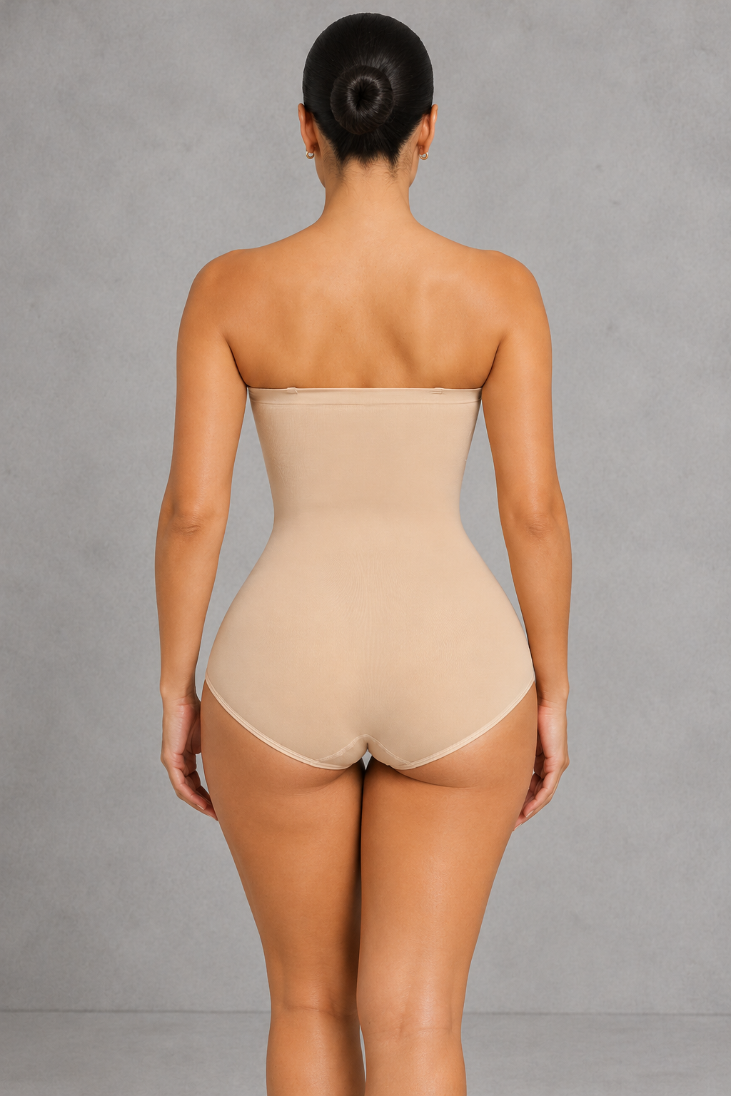 Sculp seamless strapless brief shaping bodysuit in nude, back view showing the full brief