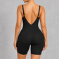 Sculp Low Back Mid-Thigh Shapewear Bodysuit in Black, back view showing low V-back and adjustable straps