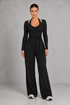 Sculp Wrap Top & Wide Leg Joggers Lounge Set in Black – front view with tie-front wrap top