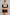 Sculp Upper Arm Shaper Top in Black – front view, worn over a bra