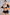 Sculp Upper Arm Shaper Top in Black – front view, showing the stretch