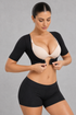 Sculp Upper Arm Shaper Top in Black – fastening the front hook closure