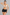 Sculp Upper Arm Shaper Top in Nude – front view, worn over a bra