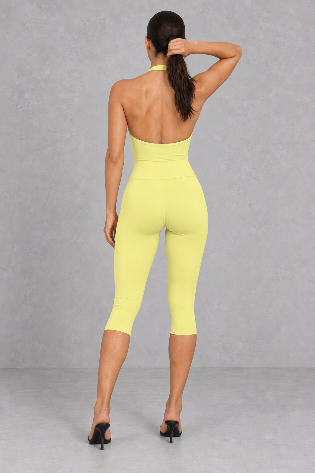 Sculp Halter Wrap Top & Capri Leggings Set in Yellow – back view showing open back