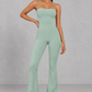 Sculp flare leg gym jumpsuit in light green, front view