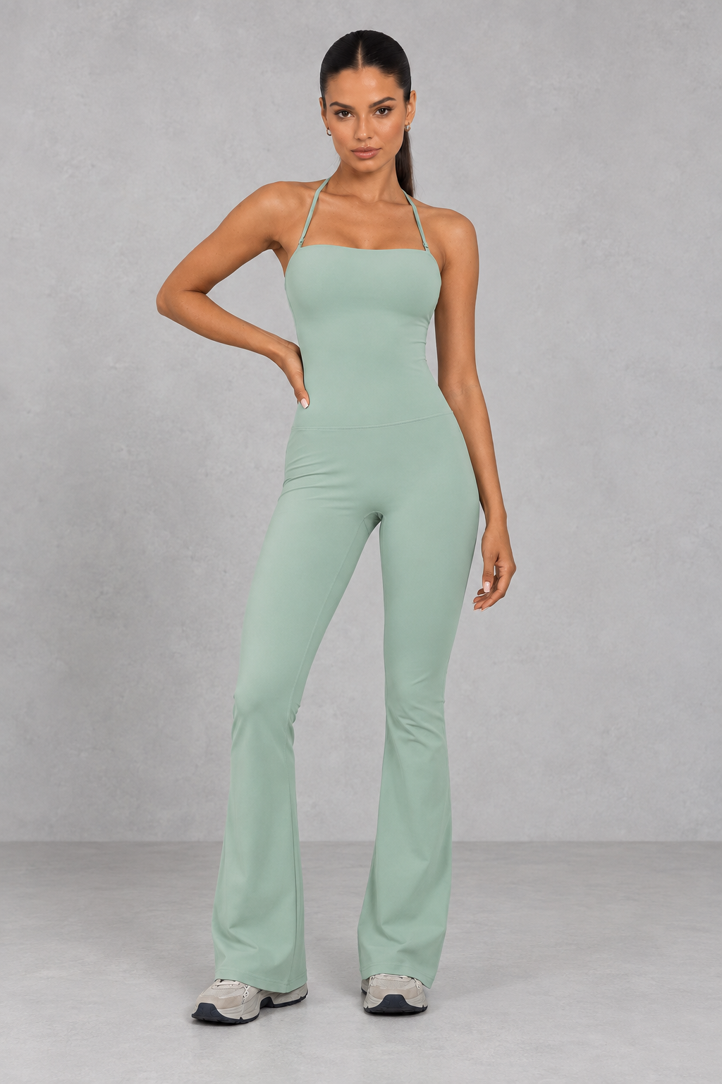Sculp flare leg gym jumpsuit in light green, front view