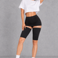 Sculp Thigh Compression Sleeves in Black – front view, worn on both thighs