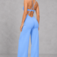 Sculp Cross-Back Wide Leg Yoga Jumpsuit – back view showing crisscross straps