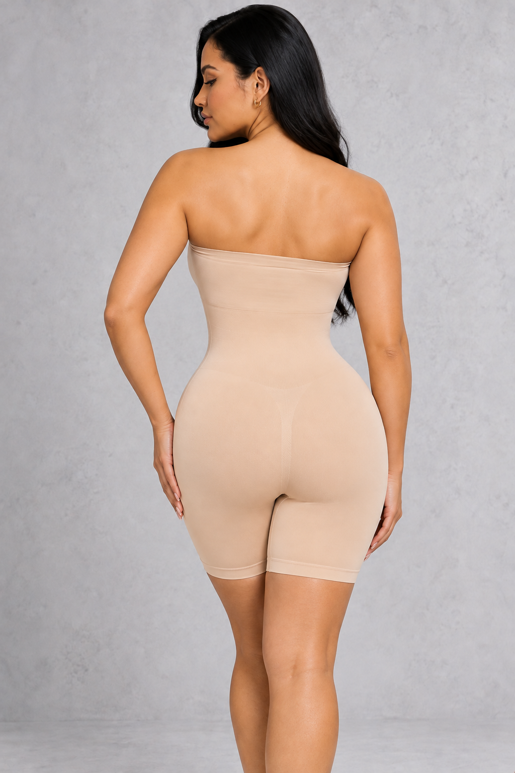 Sculp strapless mid-thigh shapewear bodysuit in nude, back view showing the bum-lift shaping