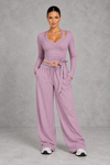 Sculp Wrap Top & Wide Leg Joggers Lounge Set in Purple – front view with tie-front wrap top