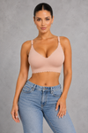 Sculp ice silk seamless wireless bra in skin – scalloped edge front view