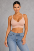 Sculp ice silk seamless wireless bra in skin – scalloped edge front view