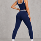 Sculp Crossover Leggings & Sports Bra Gym Set in Navy Blue – back view showing contoured seam