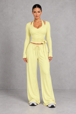 Sculp Wrap Top & Wide Leg Joggers Lounge Set in Light Yellow – front view with tie-front wrap top