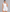 Sleeveless open back gym unitard with mid-thigh shorts