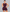 Sleeveless open back gym unitard with mid-thigh shorts