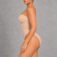 Sculp strapless high-leg compression bodysuit in nude, side view showing the bum-lift back