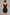 Sculp seamless zip-front mid-thigh shaping bodysuit in black, back view with butt lift