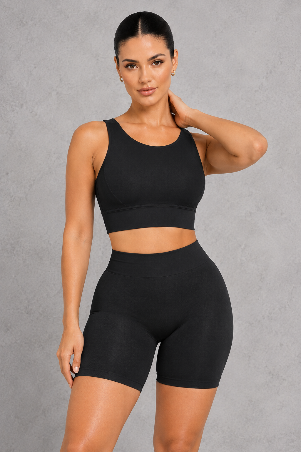Sculp seamless scoop neck sports bra in black with cycling shorts