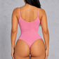 Sculp Thong Shapewear Bodysuit in Pink – back view showing thong back and adjustable straps
