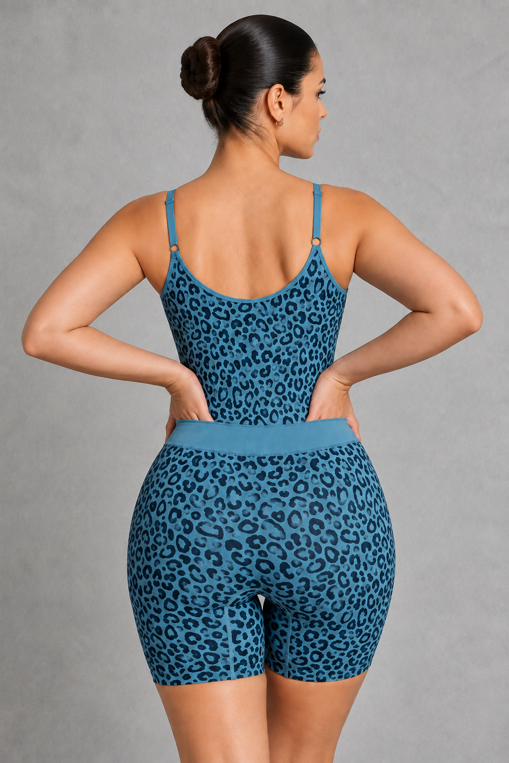 Sculp leopard print mid-thigh shaping bodysuit in blue leopard, back view with butt lift
