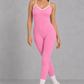 Sculp backless gym jumpsuit in baby pink, front view