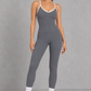 Sculp backless gym jumpsuit in dark grey, front view
