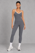 Sculp backless gym jumpsuit in dark grey, front view