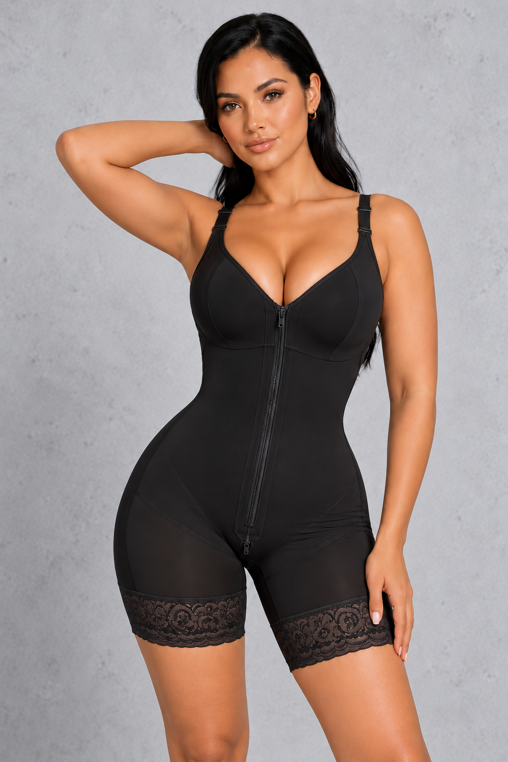 Sculp Colombian faja in black with front zip and lace-trim legs, front view