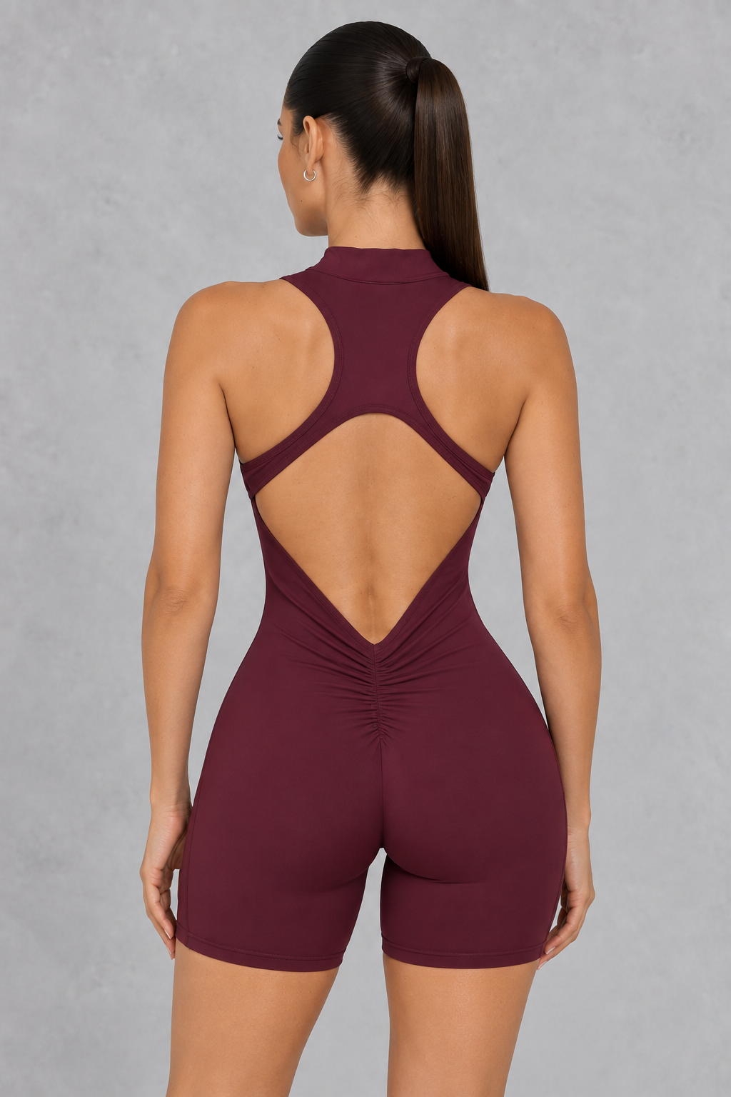 Sculp open back zip gym romper in burgundy, detail view