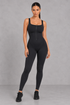 Sculp sauna sweat jumpsuit in black, front view