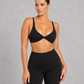 Sculp twist front sports bra in black, front view