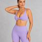 Sculp twist front sports bra in dreamy purple, front view