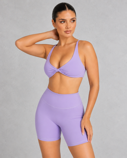 Sculp twist front sports bra in dreamy purple, front view