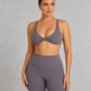 Sculp twist front sports bra in gray, front view