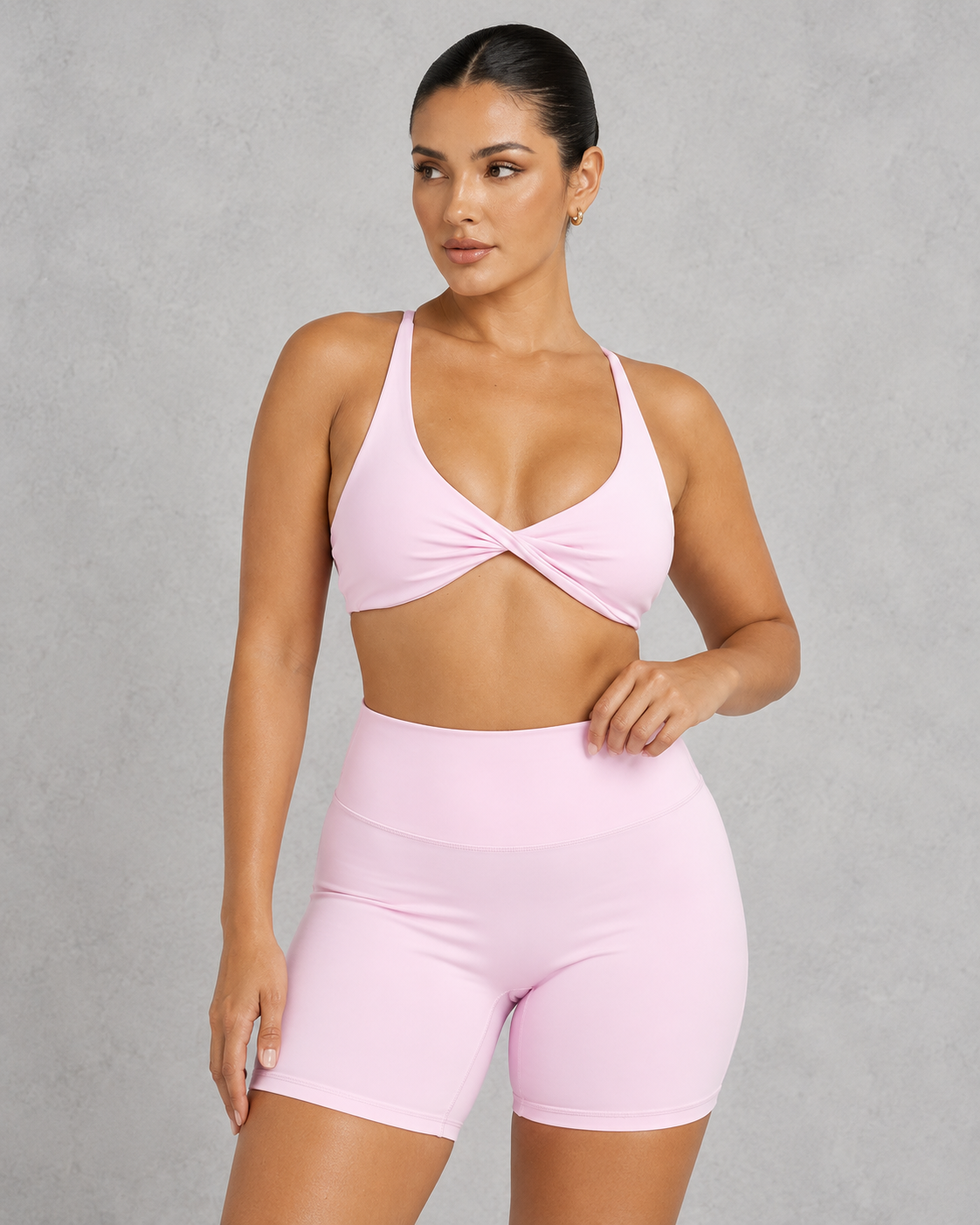 Sculp twist front sports bra in vitamin pink, front view