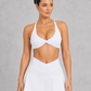 Sculp twist front sports bra in white, front view