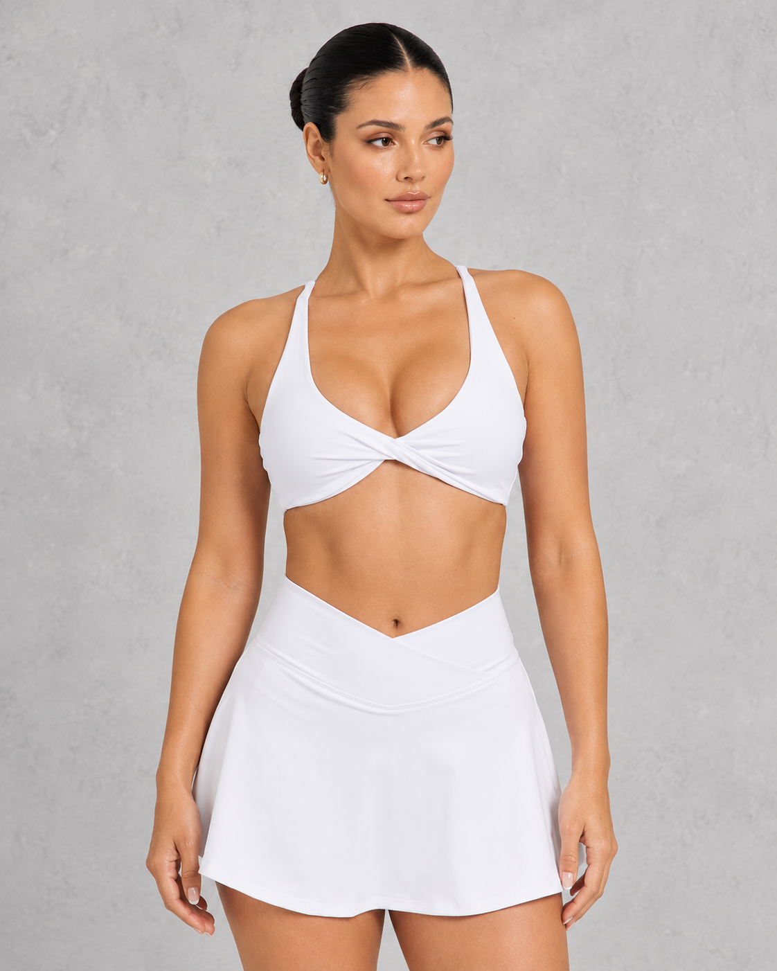 Sculp twist front sports bra in white, front view