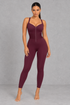 Sculp waist cinching shaping jumpsuit in red, front view