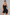 Sculp zip-front racerback gym romper in black, front view