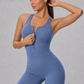 Sculp zip-front racerback gym romper in blue, front view