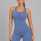 Sculp zip-front racerback gym romper in blue, detail view