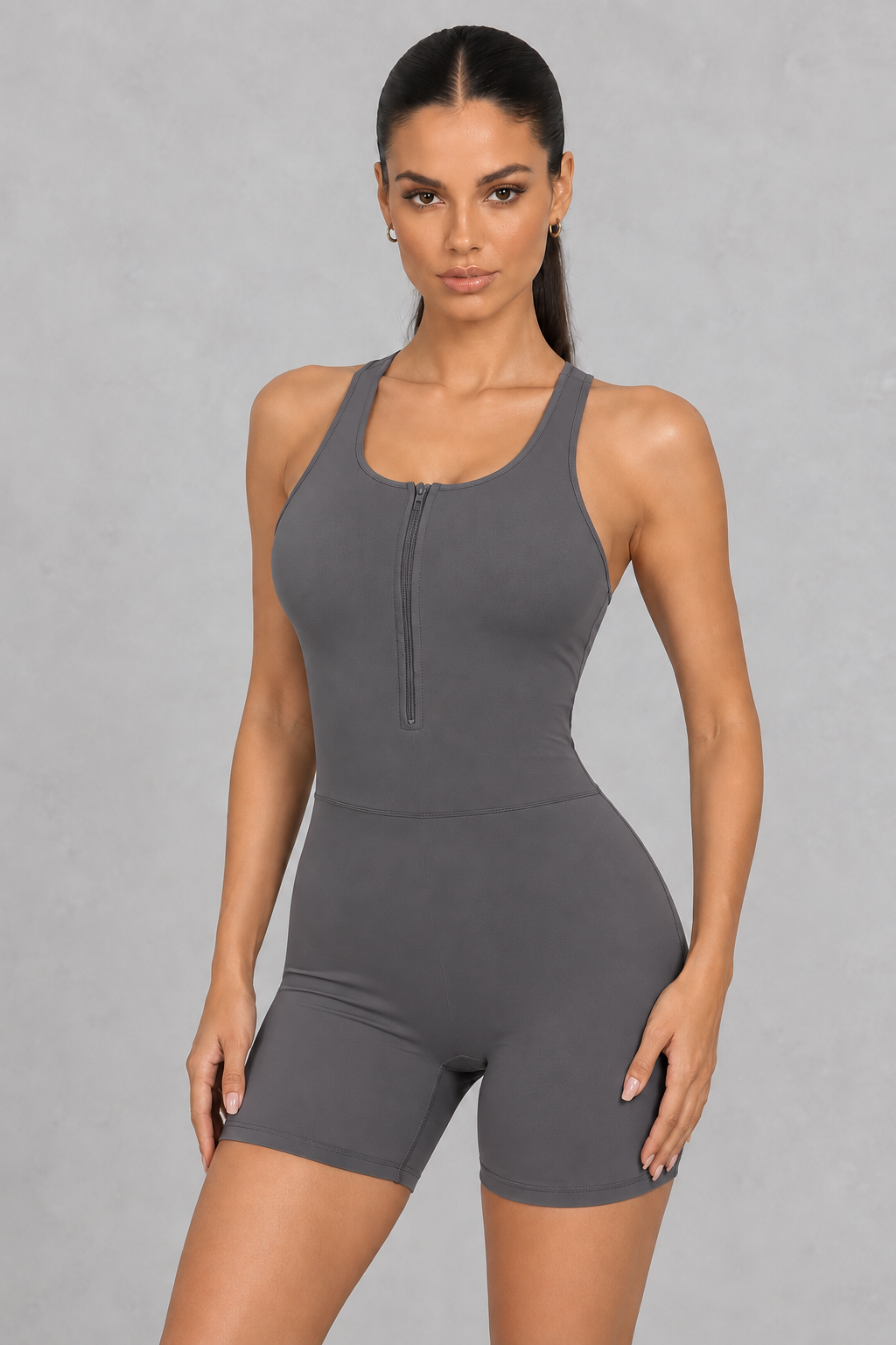 Sculp zip-front racerback gym romper in grey, front view