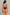 Rear view of a woman modeling a black high-cut one-piece swimsuit with thin shoulder straps against a textured gray background.
